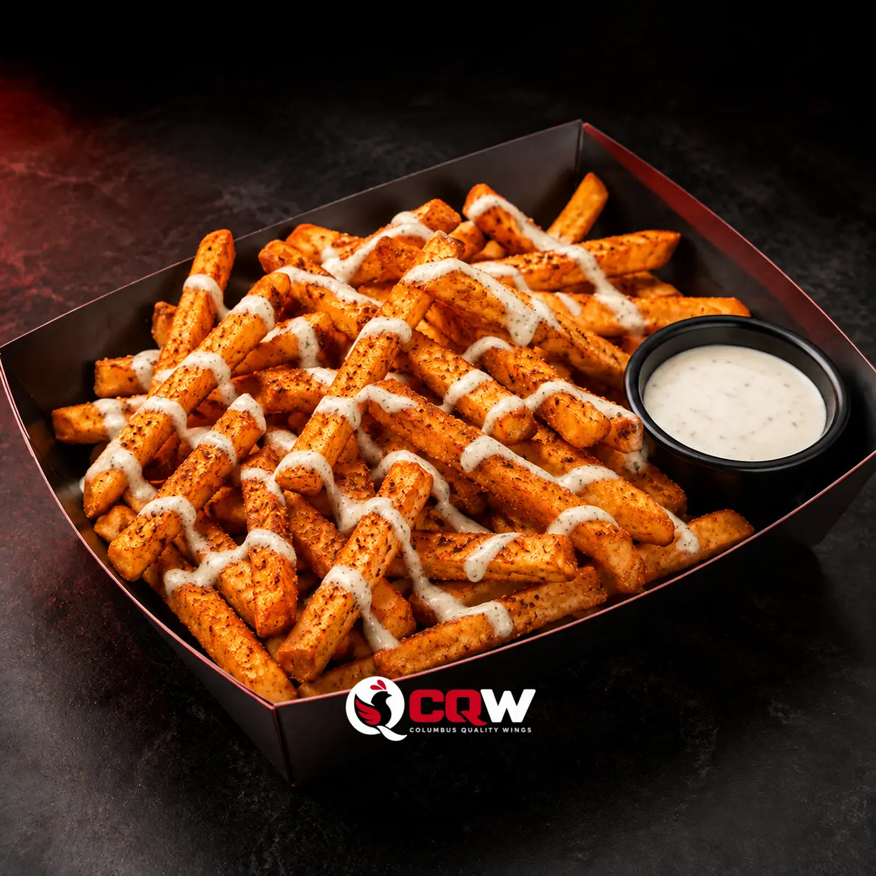 Cajun Ranch fries in a branded CQW takeout tray